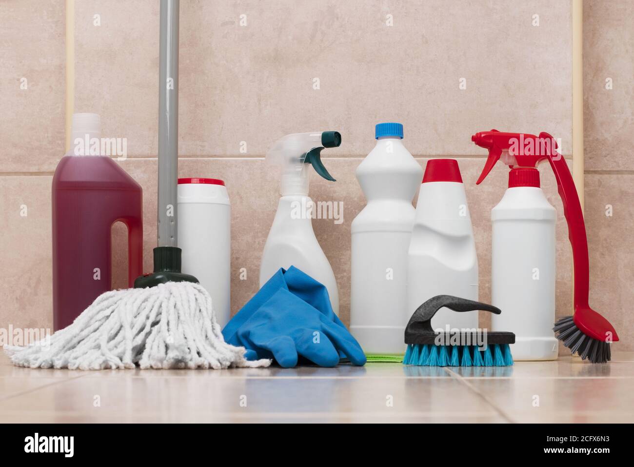 Cleaning equipment on bathroom floor tiles Stock Photo - Alamy