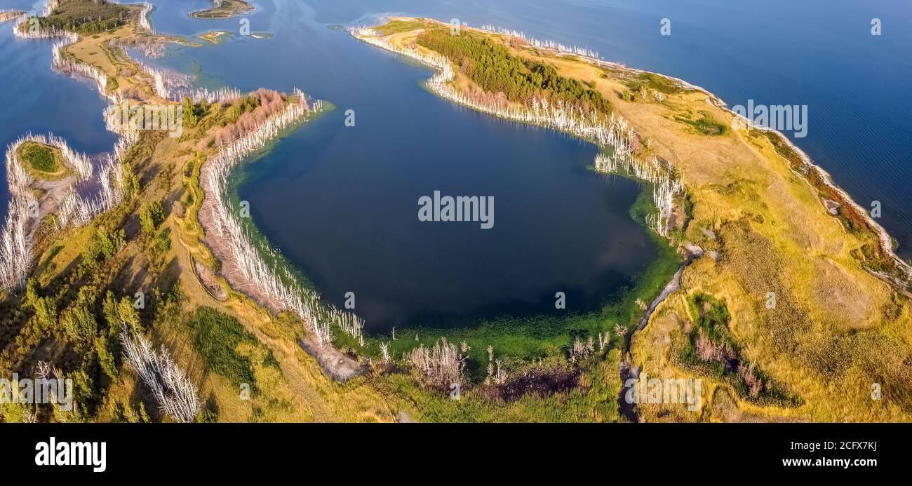 Beautiful panoramic high angle aerial drone shot of a cove on one of ...