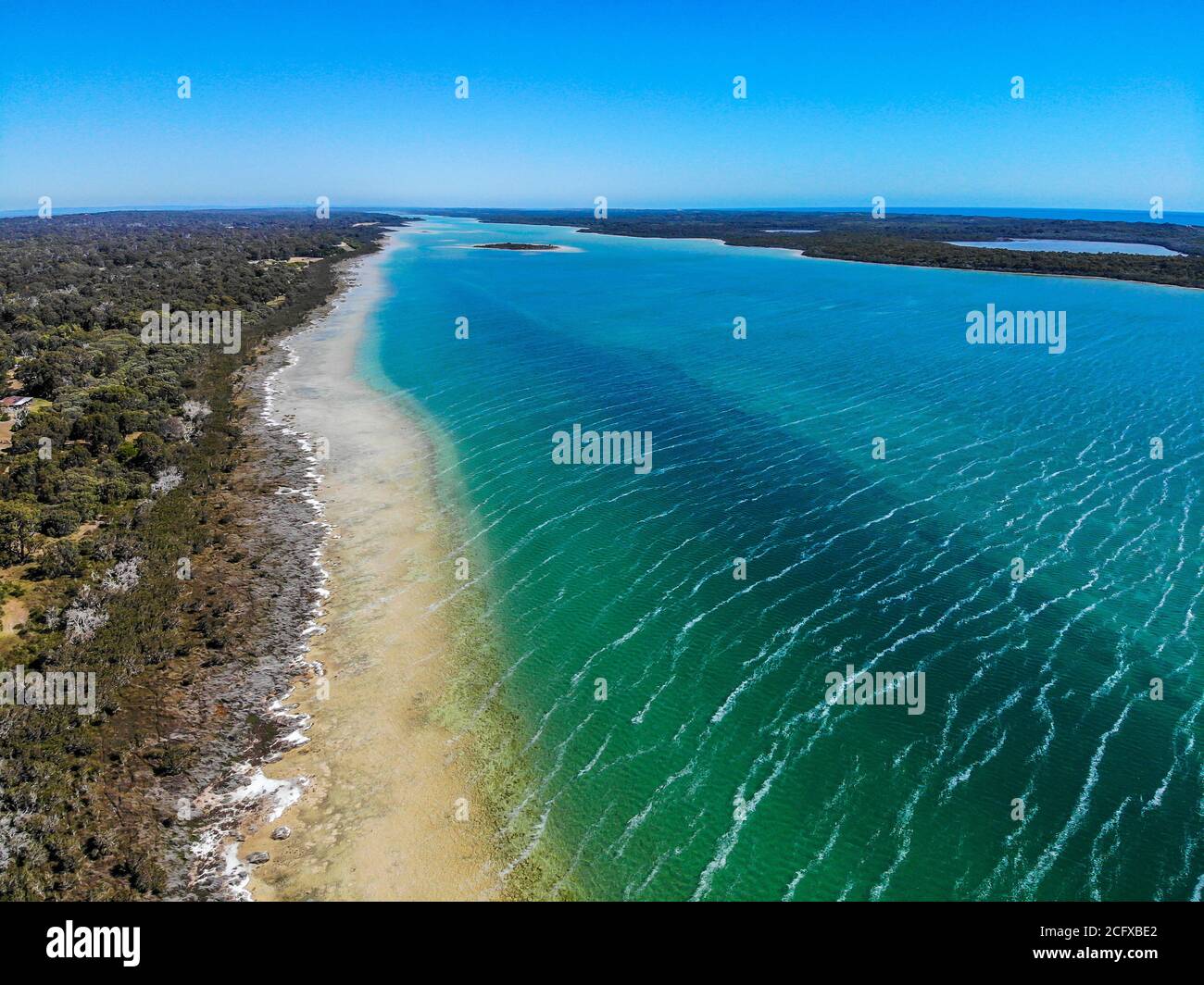 Aerial photograph above the shore of Lake Clifton in Western Australia