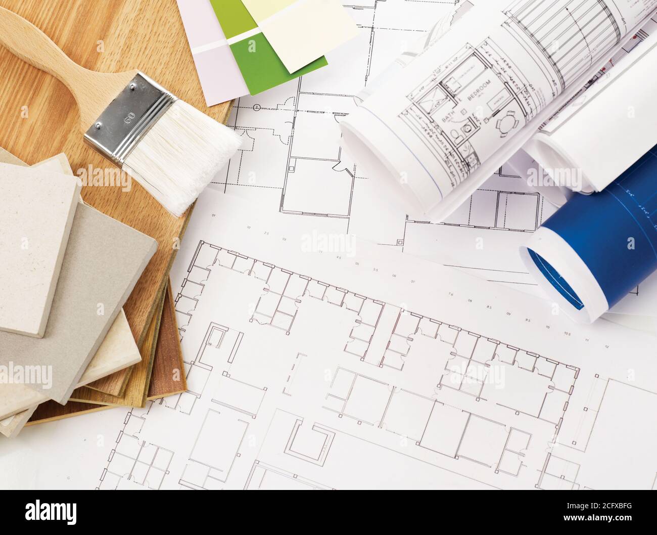 Blueprints, wood and stone samples Stock Photo - Alamy