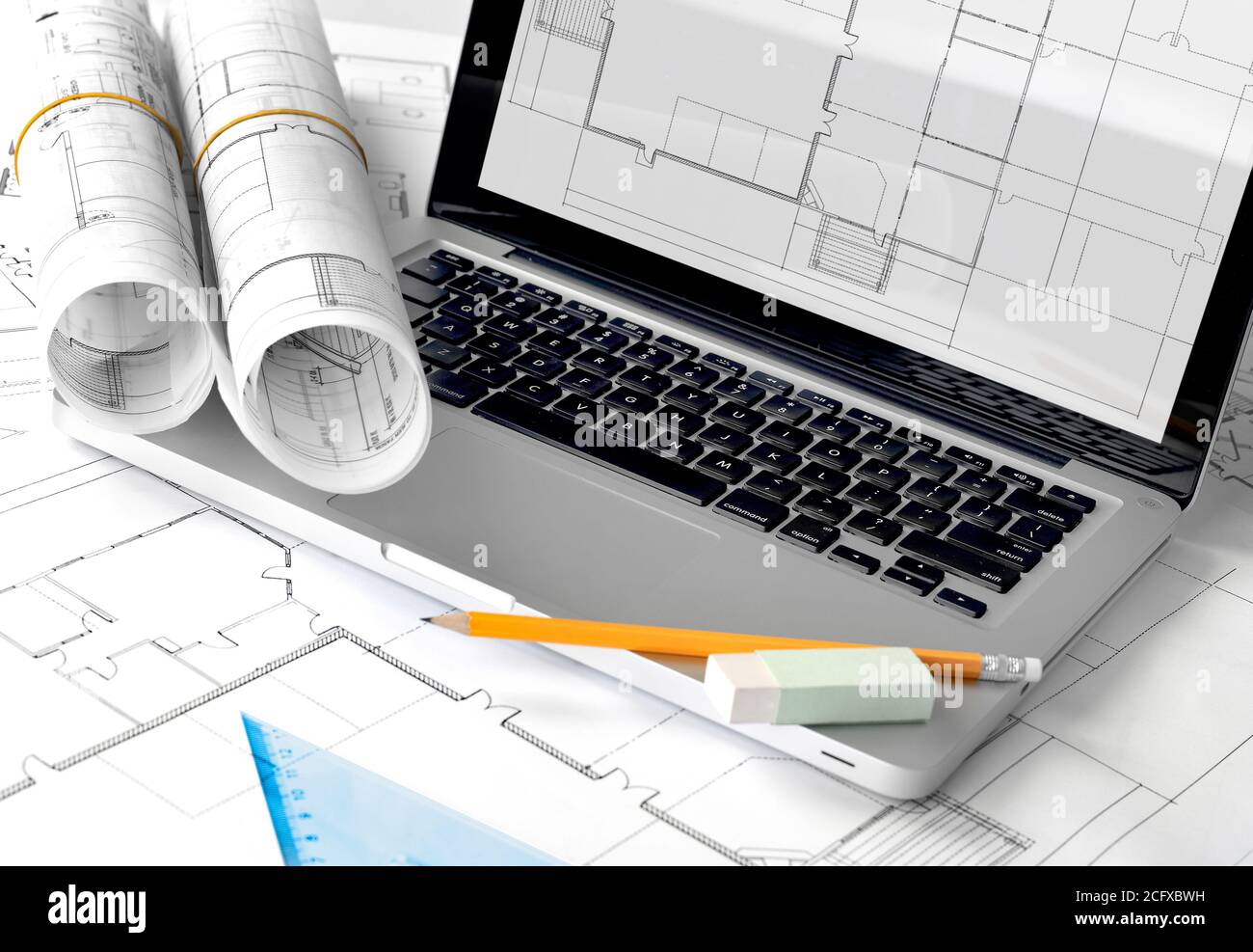 Blueprints and laptop Stock Photo Alamy