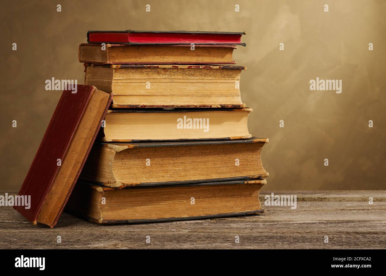 Vintage books stack Stock Photo - Alamy
