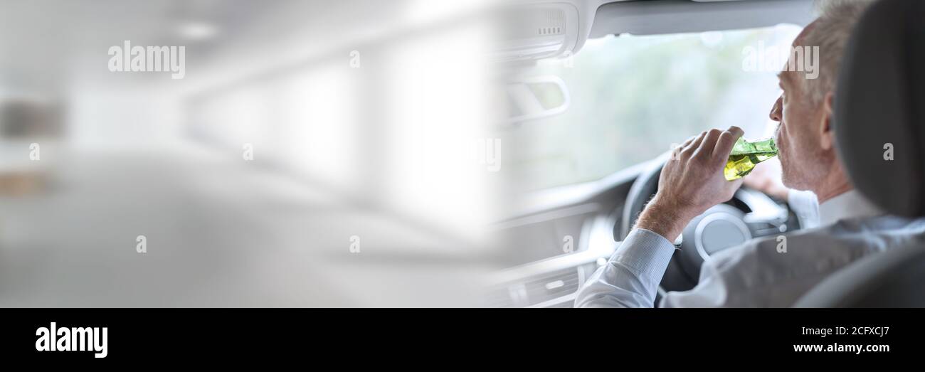 Man drinking alcohol while driving a car; panoramic banner Stock Photo ...