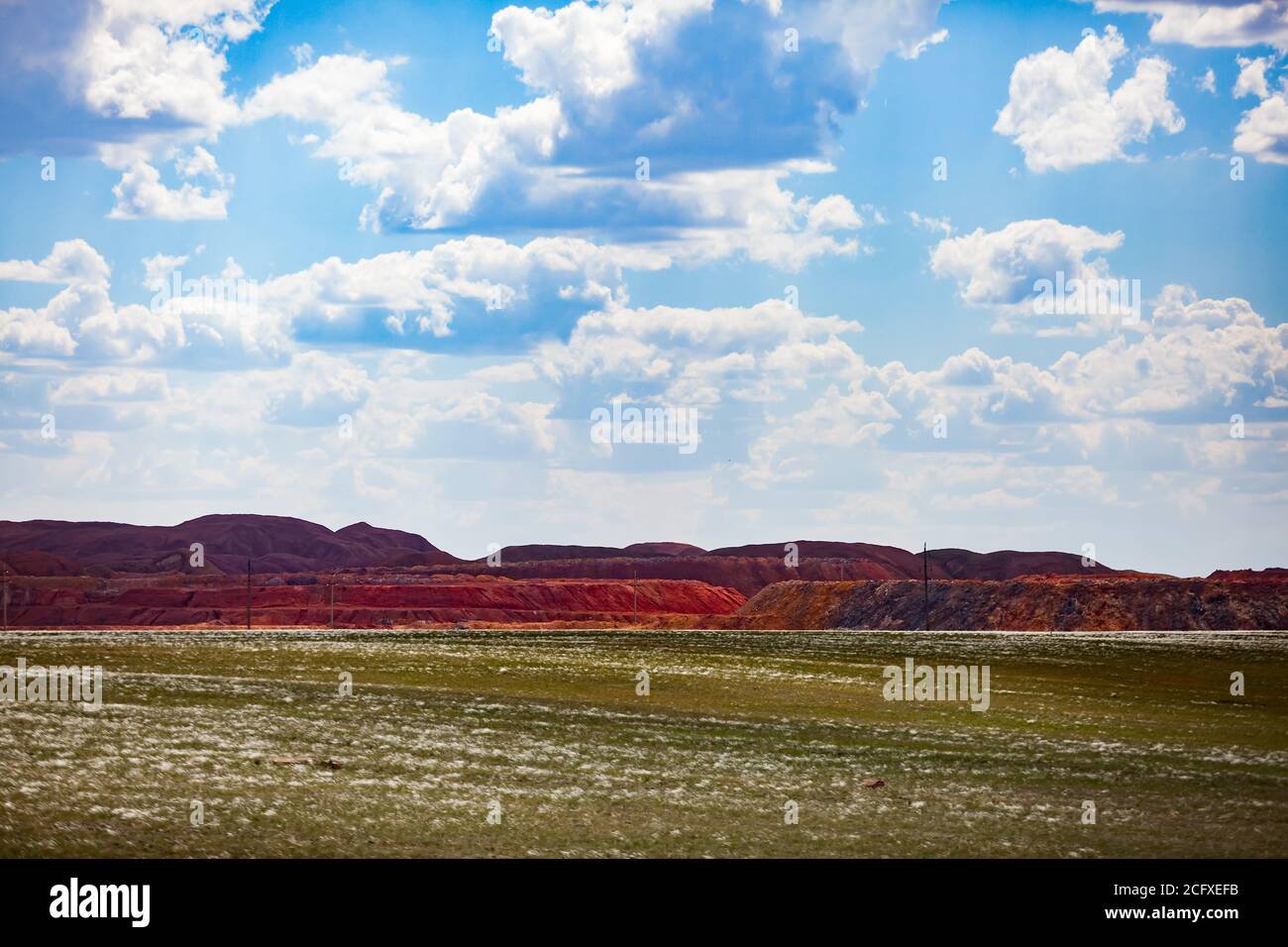 Aluminium quarry burrow of open cast (open cut) mining.  Red bauxite mine. Stock Photo