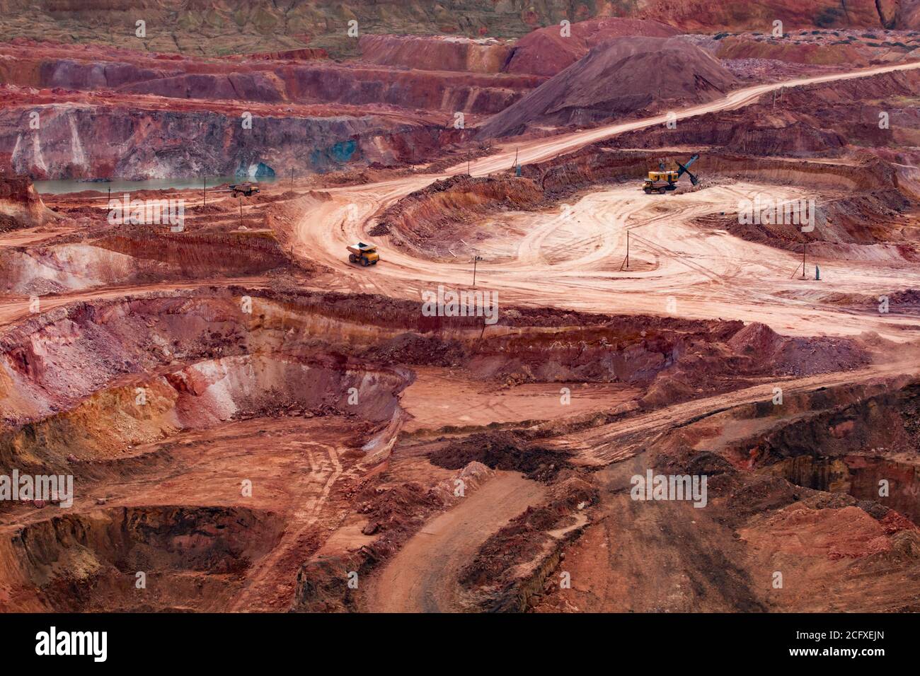 Color aluminium ore quarry. Bauxite open cast (open cut) mining. Quarry