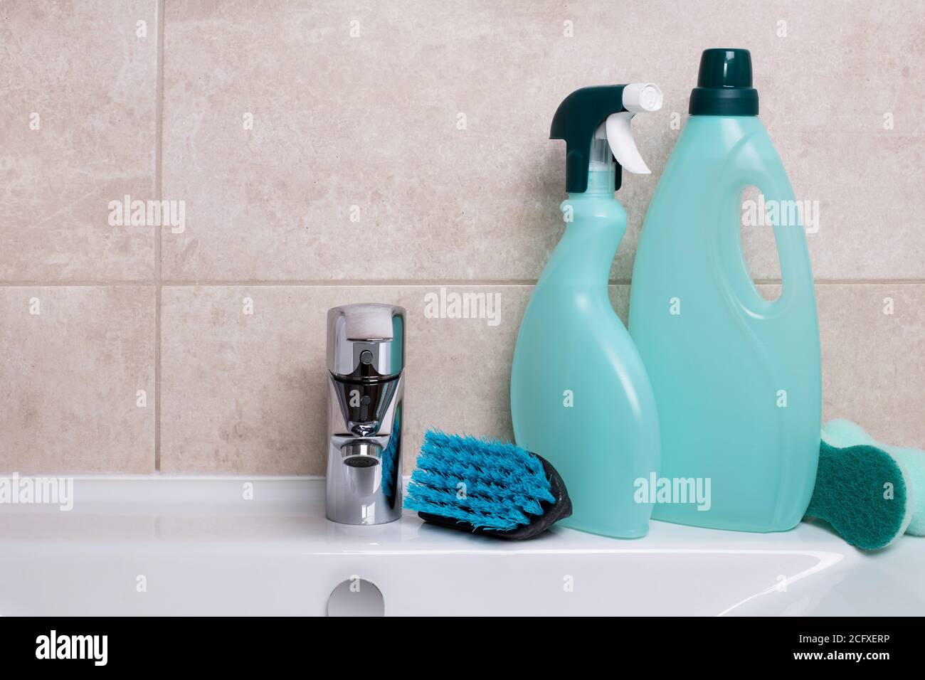 Cleaning products on sink Stock Photo - Alamy