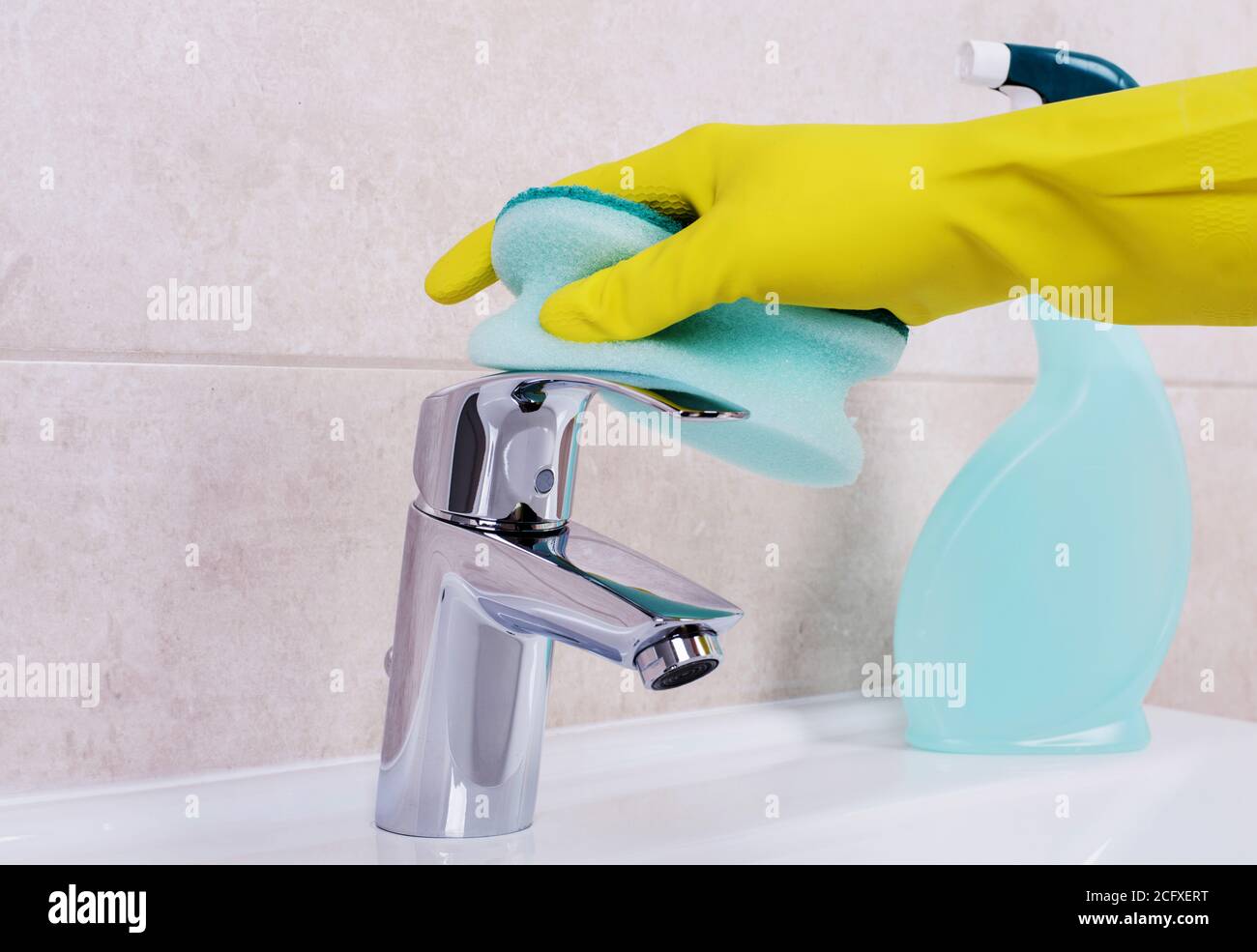 Cleaning the water tap Stock Photo Alamy