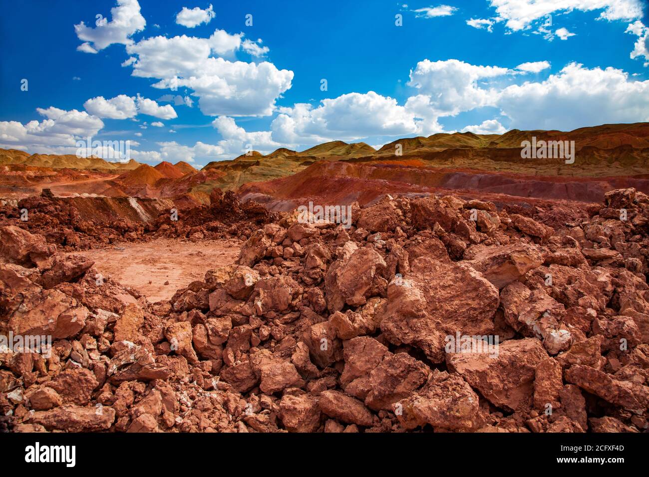 Aluminium ore quarry. Bauxite clay opencut mining. Quarry stones