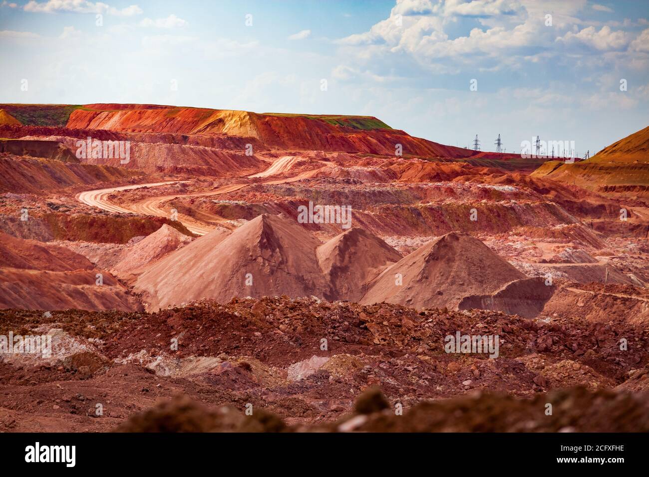 Aluminium ore quarry. Bauxite clay opencut mining. Heaps of empty