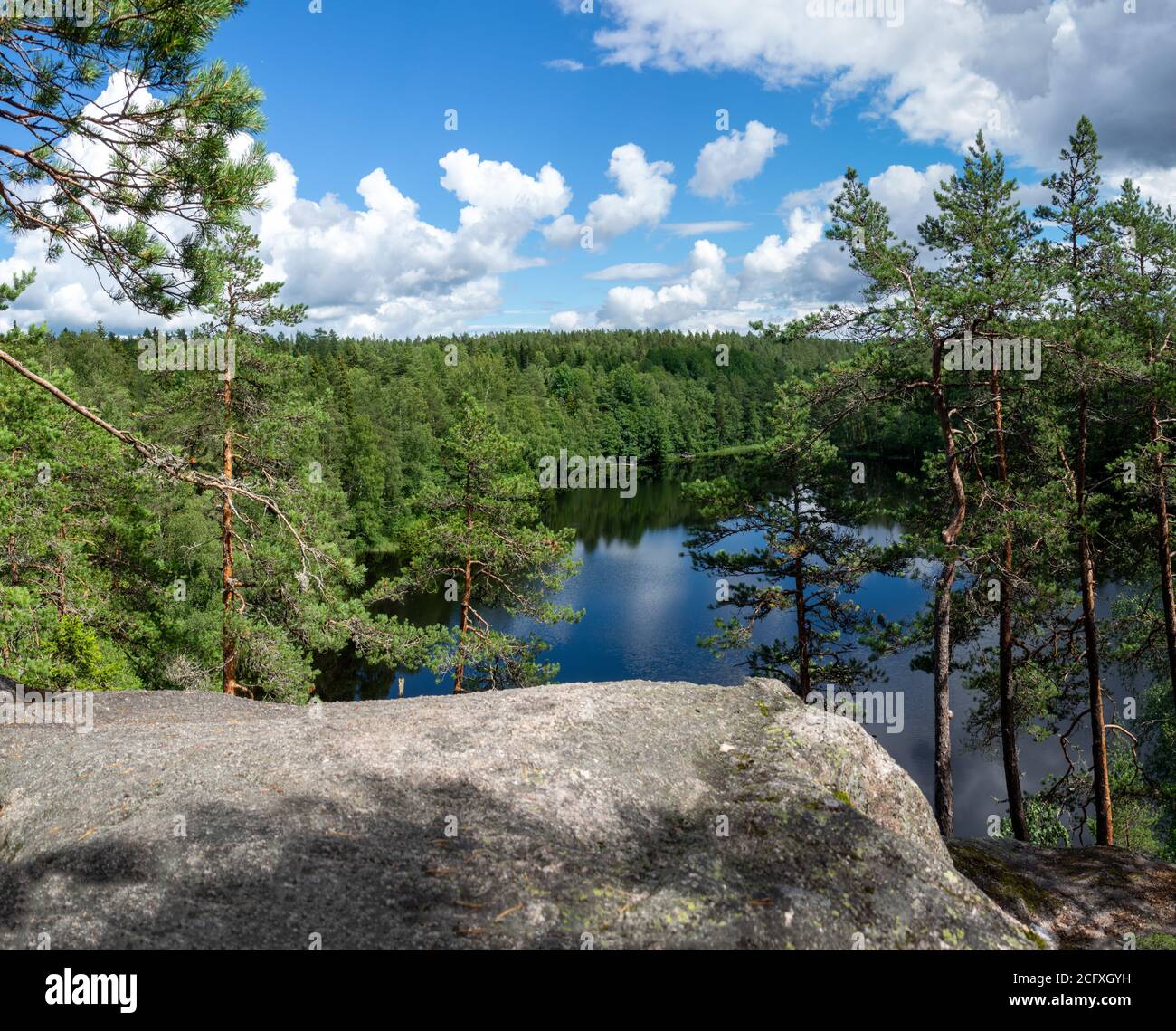 Summer lake scene at hiking trail in Nuuksio national park, Espoo, Finland. Stock Photo