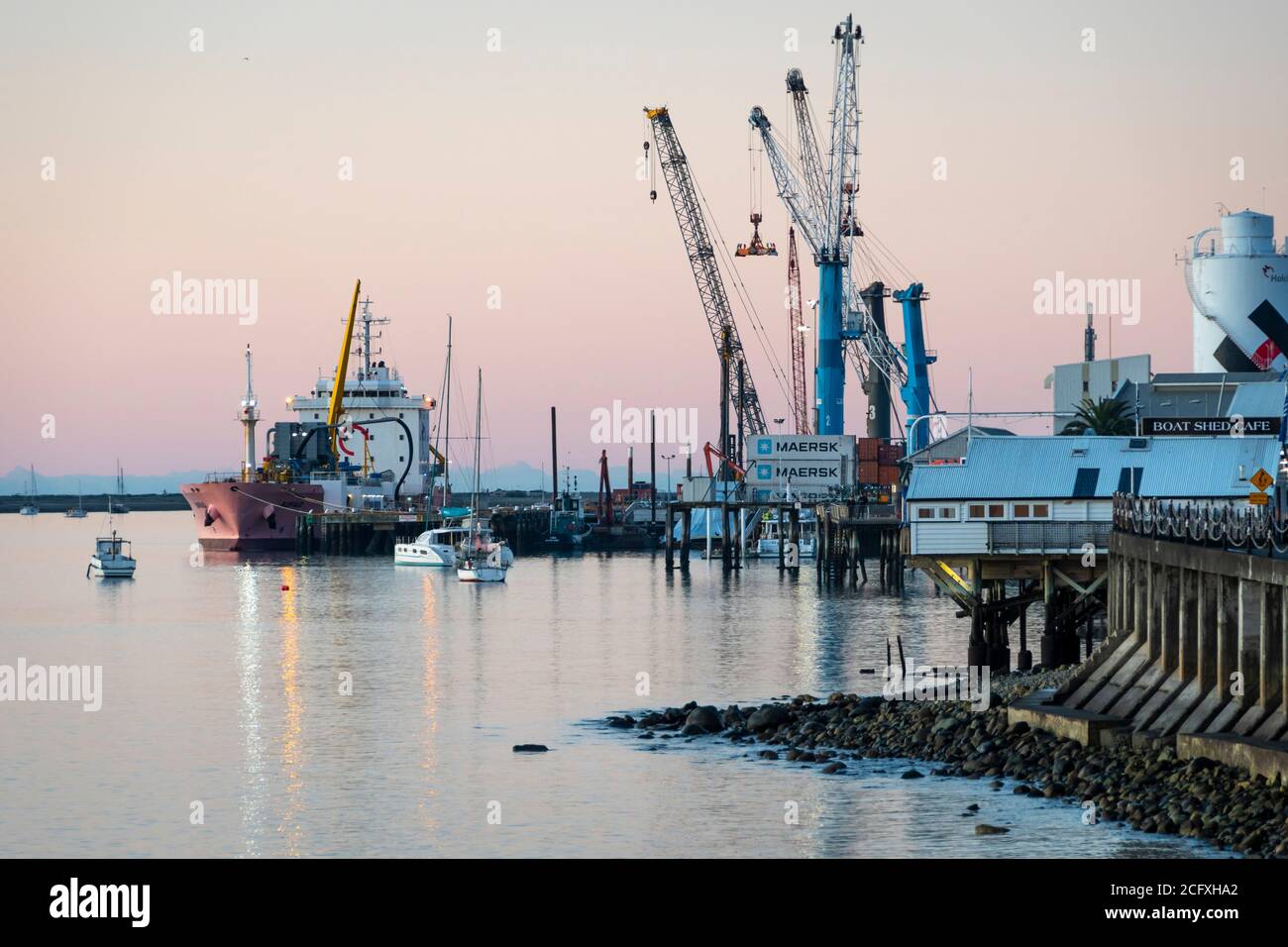 Cranes and ship at Port of Nelson, South Island, New Zealand Stock Photo