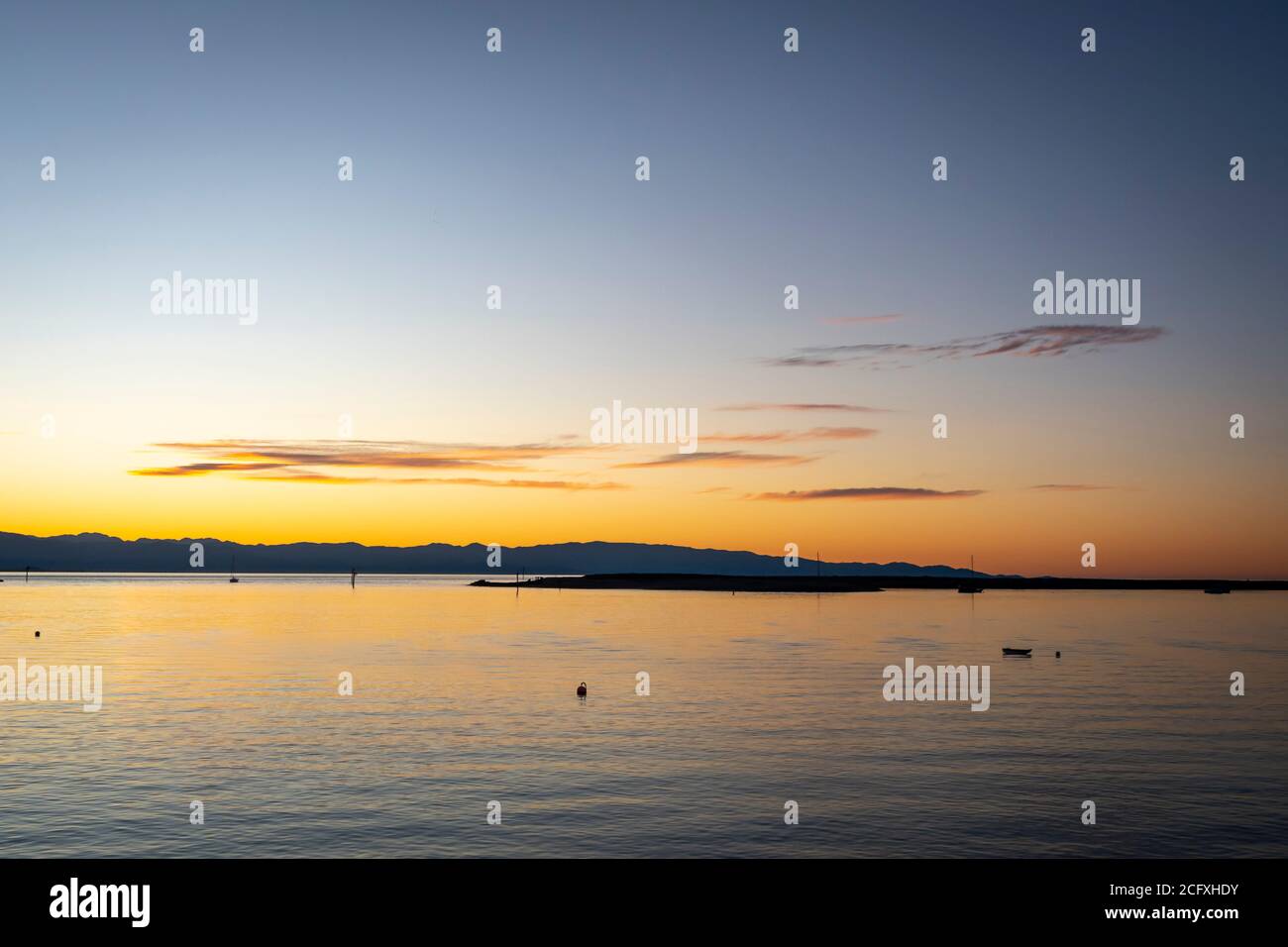 Sunset over Tasman Bay, Nelson, South Island, New Zealand Stock Photo