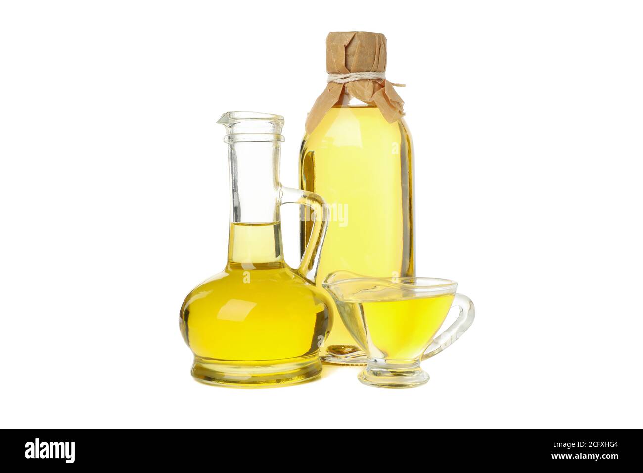 Glass jars with sunflower oil isolated on white background Stock Photo