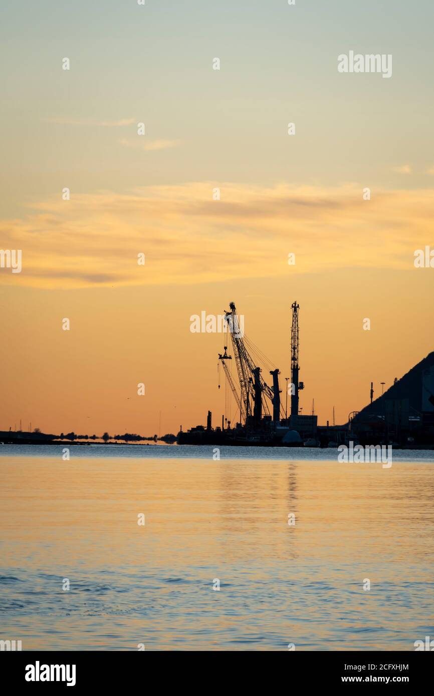 Cranes and ship at Port of Nelson, South Island, New Zealand Stock Photo