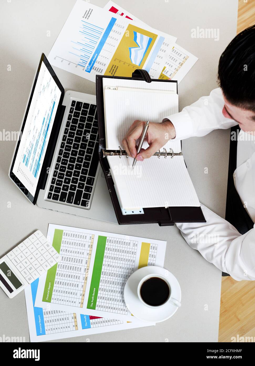 Businessman taking notes Stock Photo