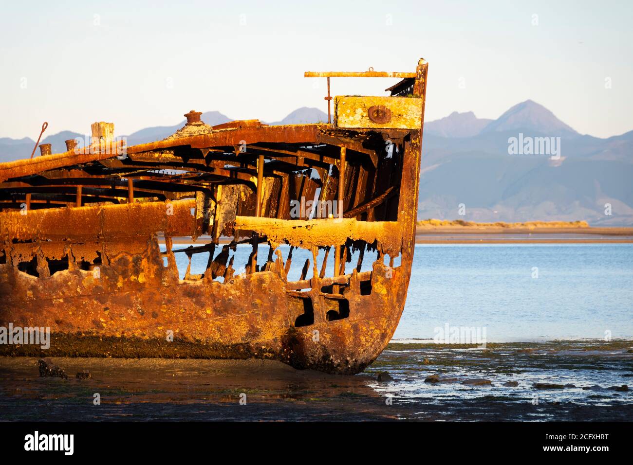 Wreck of the Janie Seddon, built in 1901, on the beach at Motueka, Nelson, South Island, New Zealand Stock Photo