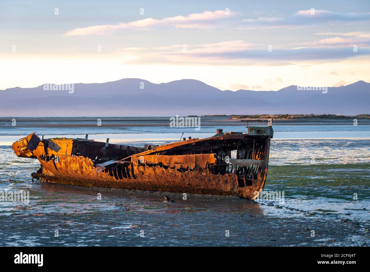 Wreck of the Janie Seddon, built in 1901, on the beach at Motueka, Nelson, South Island, New Zealand Stock Photo