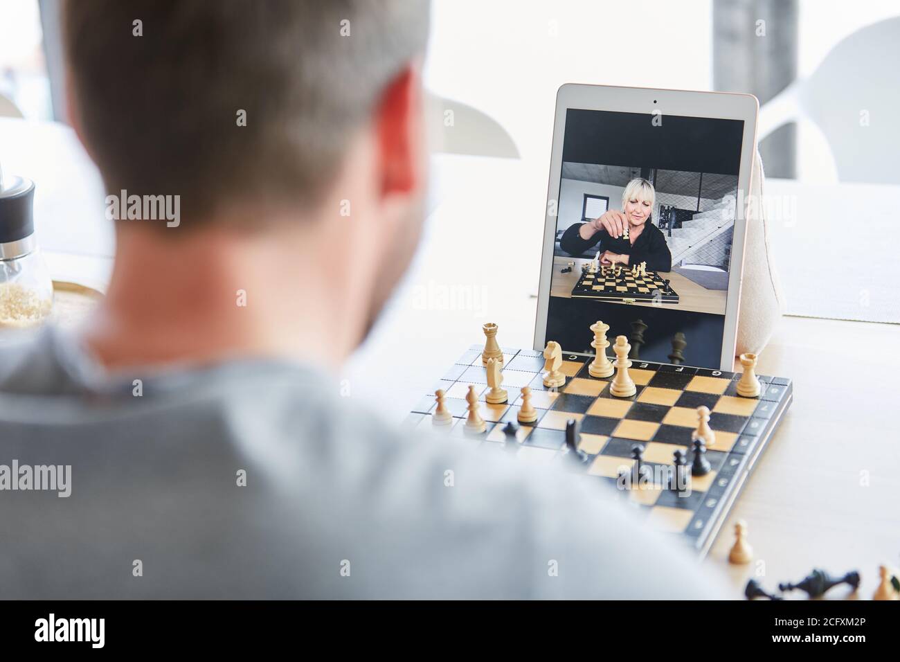 playing a chess game on iPad tablet Stock Photo - Alamy