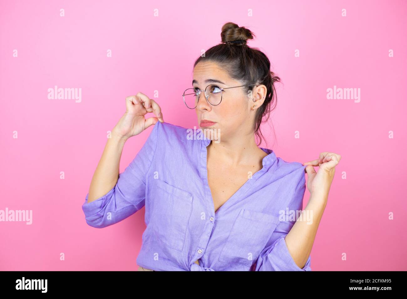 Woman wearing pink shirt glasses hi-res stock photography and images ...