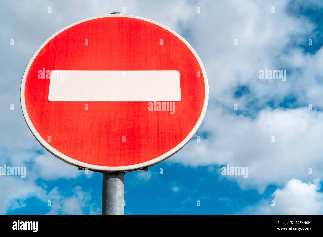 No entry for vehicular traffic. Road sign against blue sky Stock Photo ...