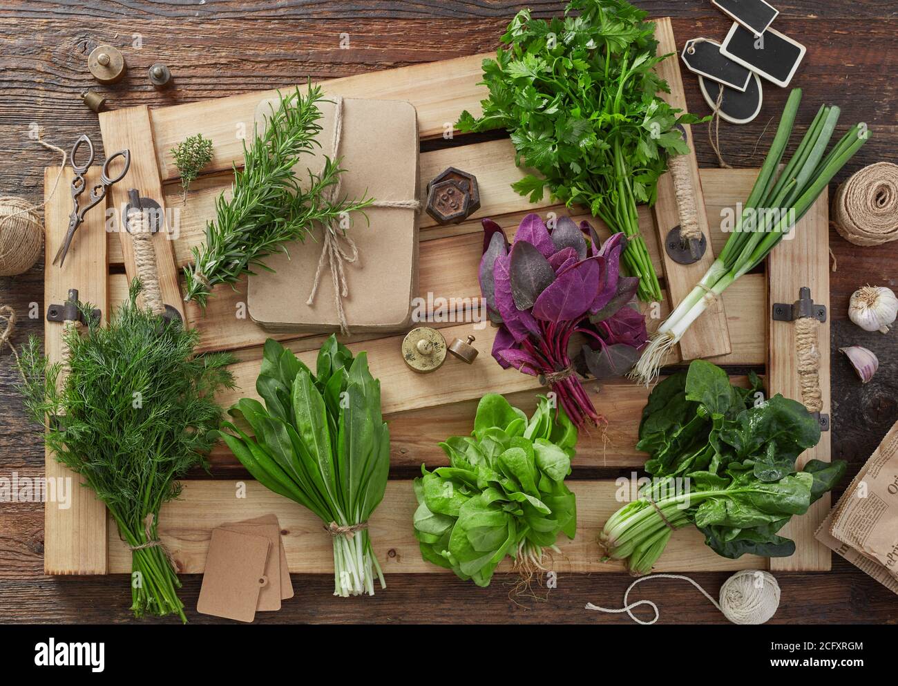 Herb leafs on wood table Stock Photo