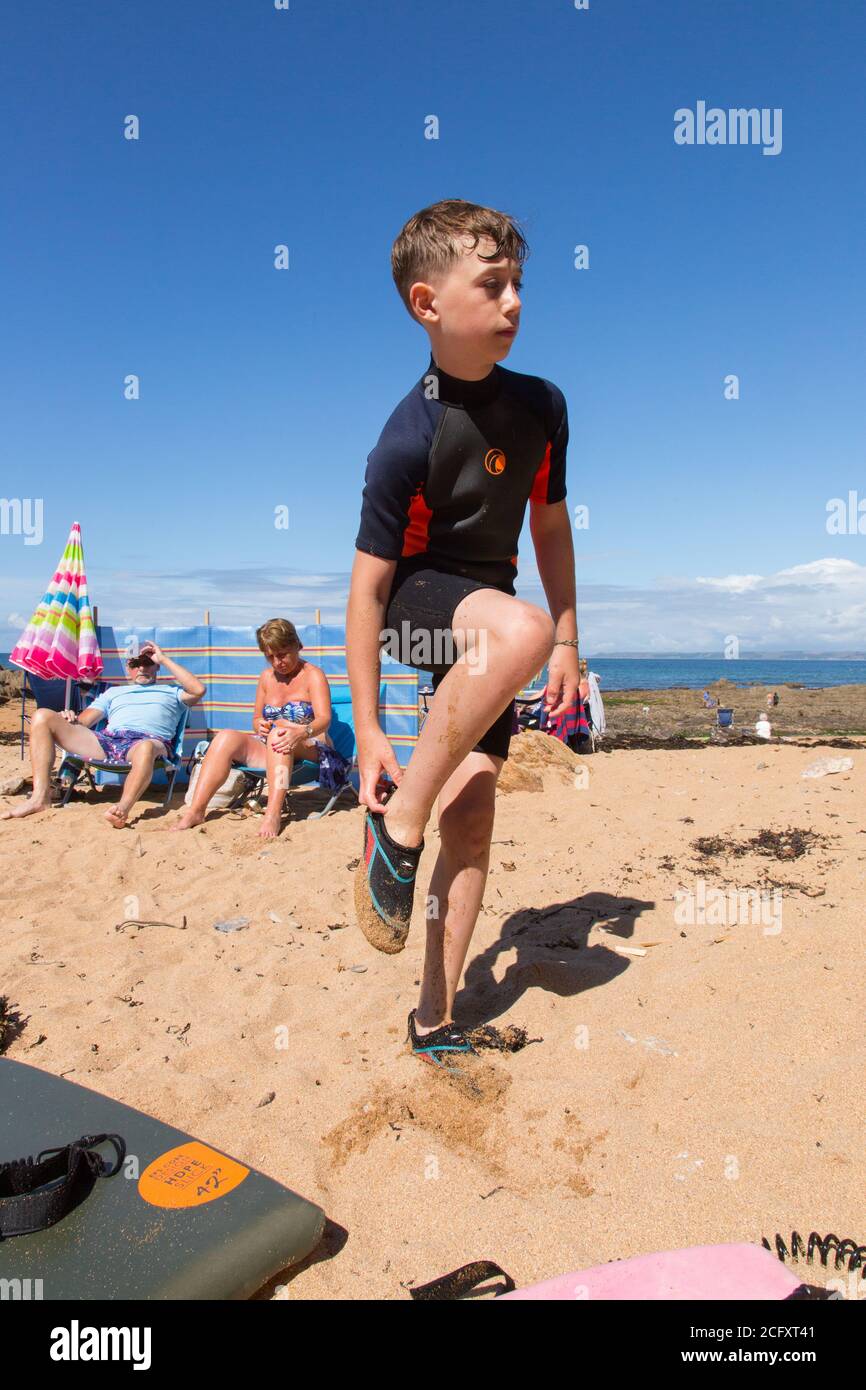 Boy in a wetsuit hires stock photography and images Alamy