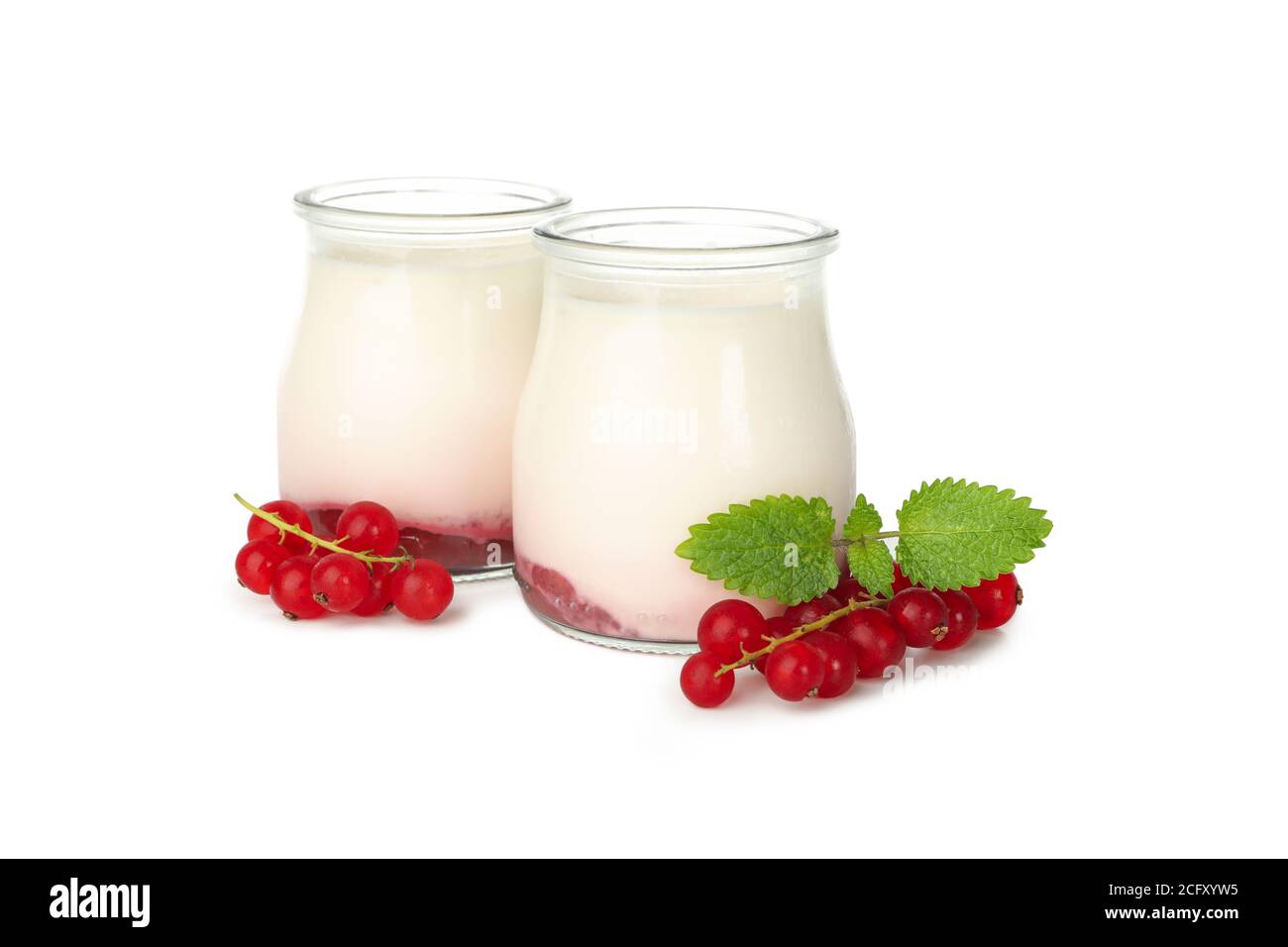 Bottles of sour cream yogurt isolated on white background Stock Photo Alamy