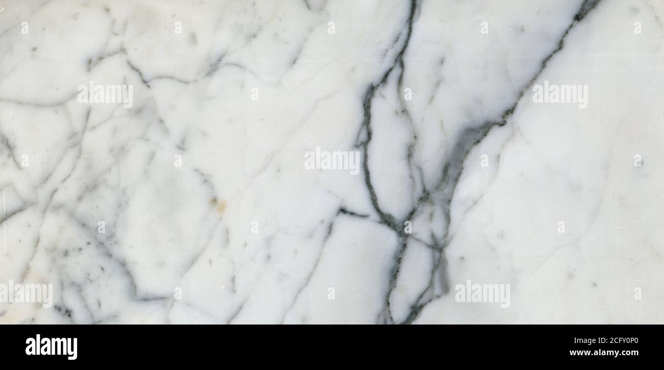 White marble texture background, Glossy Carrara limestone marbel, Satvario tiles, Italian blanco catedra stone pattern, Calacatta statuario slab. Stock Photo