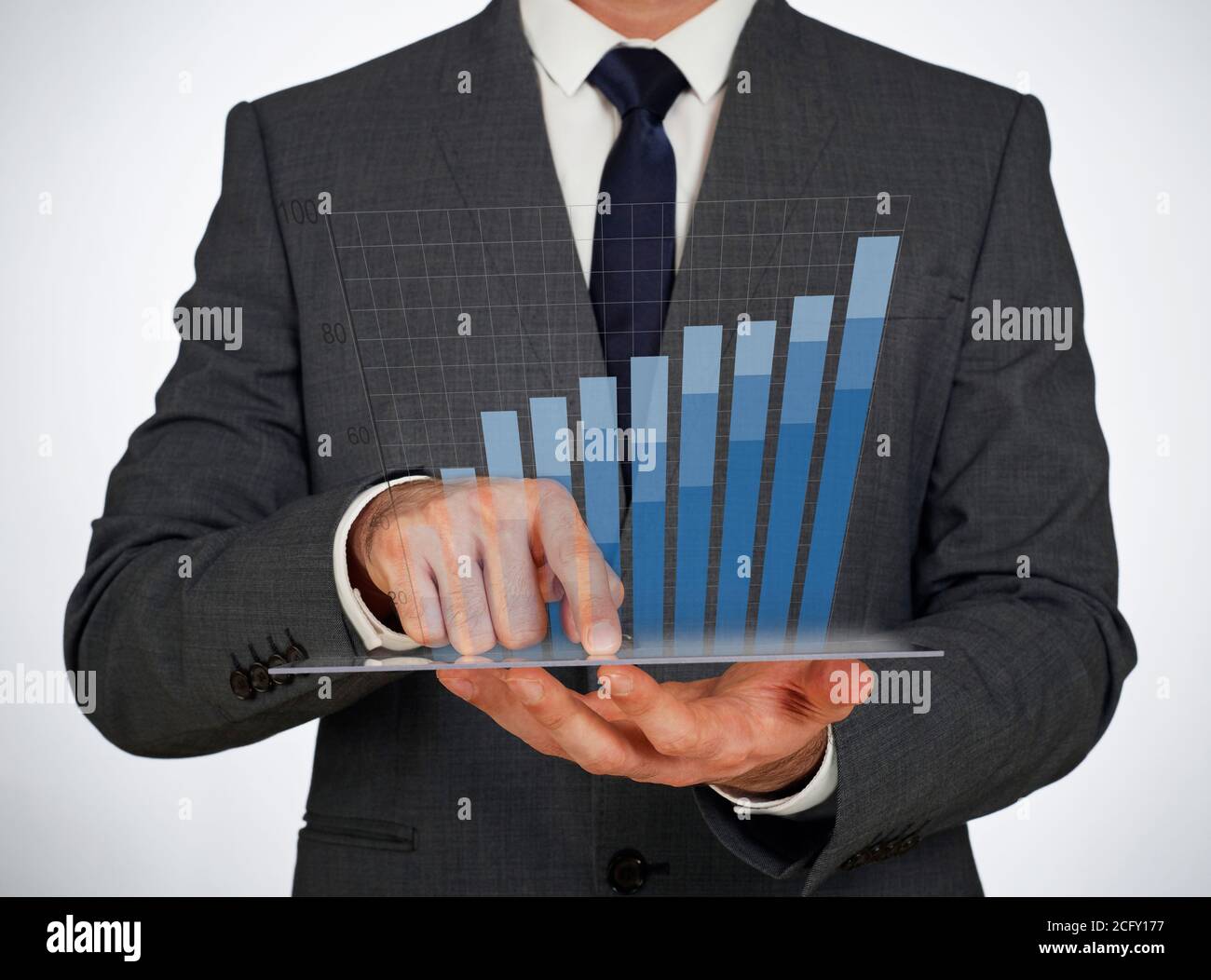 Businessman using a virtual screen Stock Photo