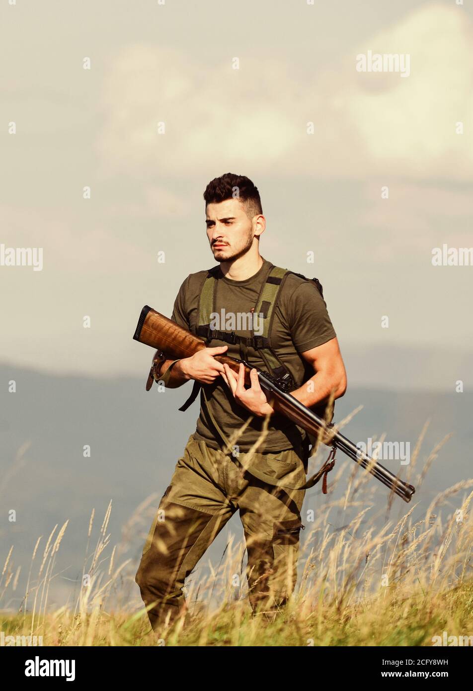 Guard the borders. Man with weapon military clothes in field nature  background. Soldier with rifle. Army forces. State border guard service.  Protecting borders of motherland. Stop illegal immigrants Stock Photo -  Alamy