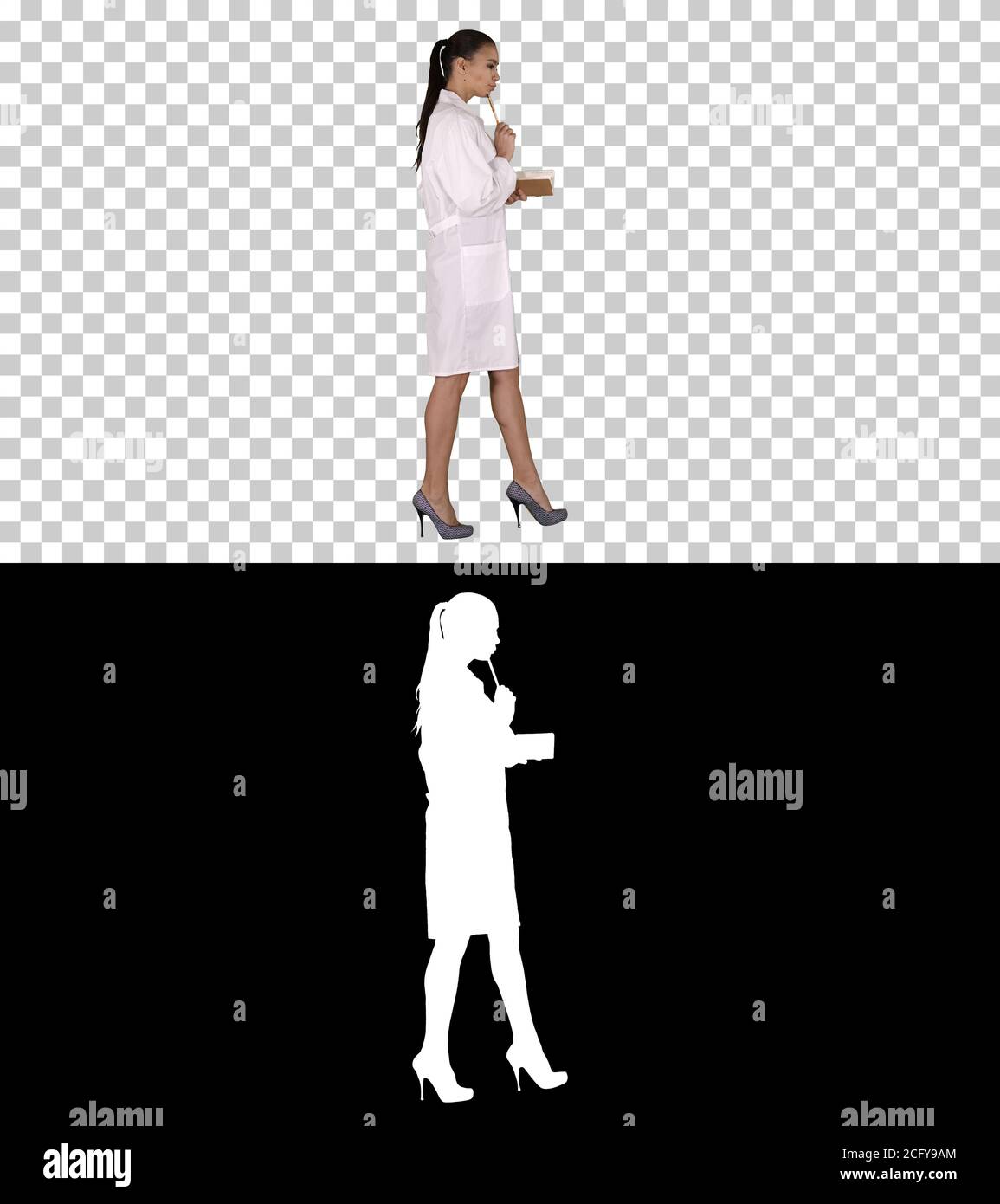 Successful medical doctors making notes while walking, Alpha Channel Stock Photo