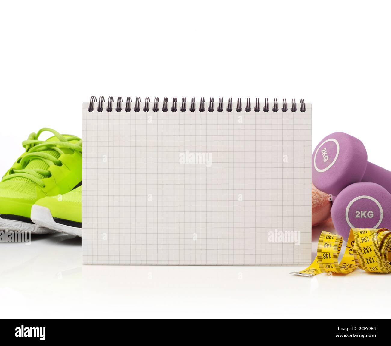 Notebook and fitness equipment isolated Stock Photo Alamy