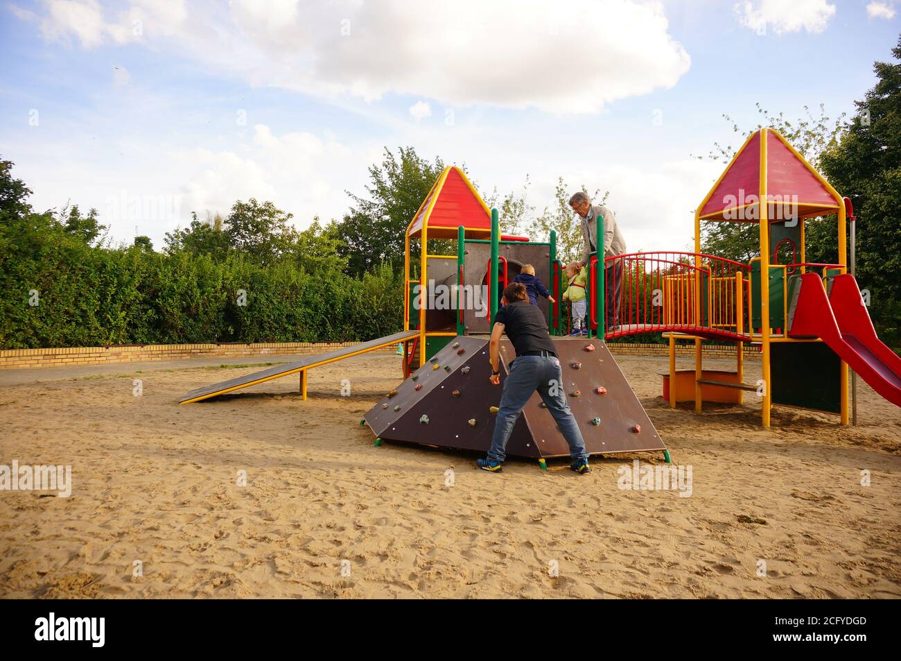 Father kid playground hi-res stock photography and images - Alamy