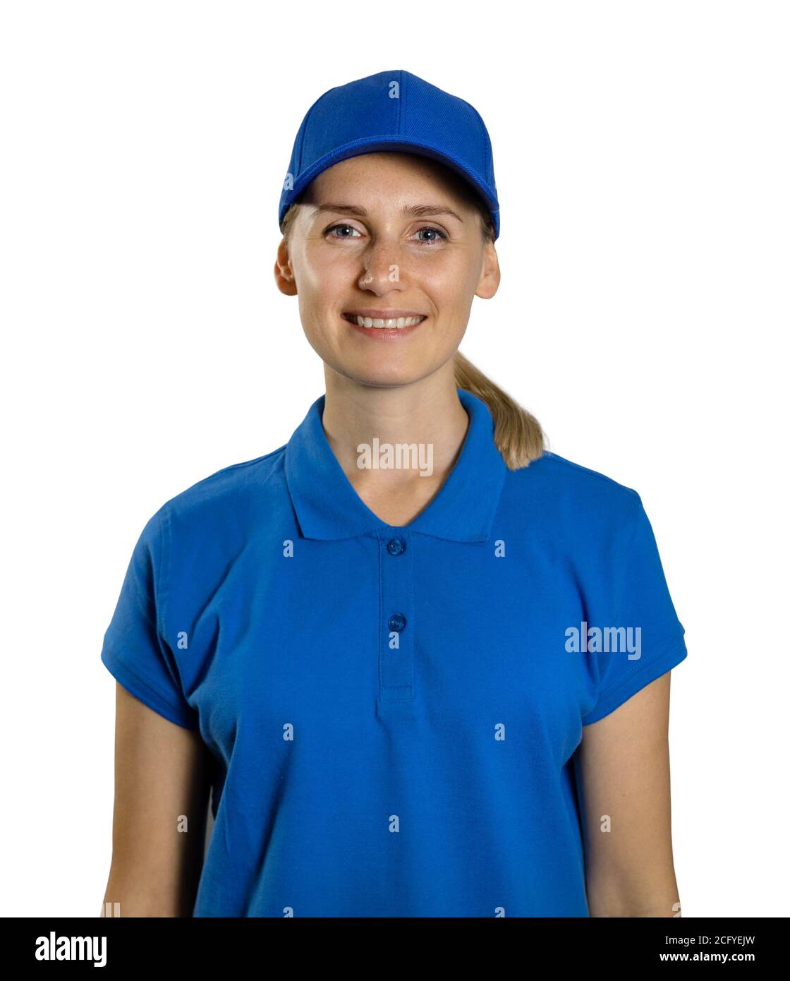 attractive smiling woman in blank blue polo shirt and hat isolated on white background Stock Photo