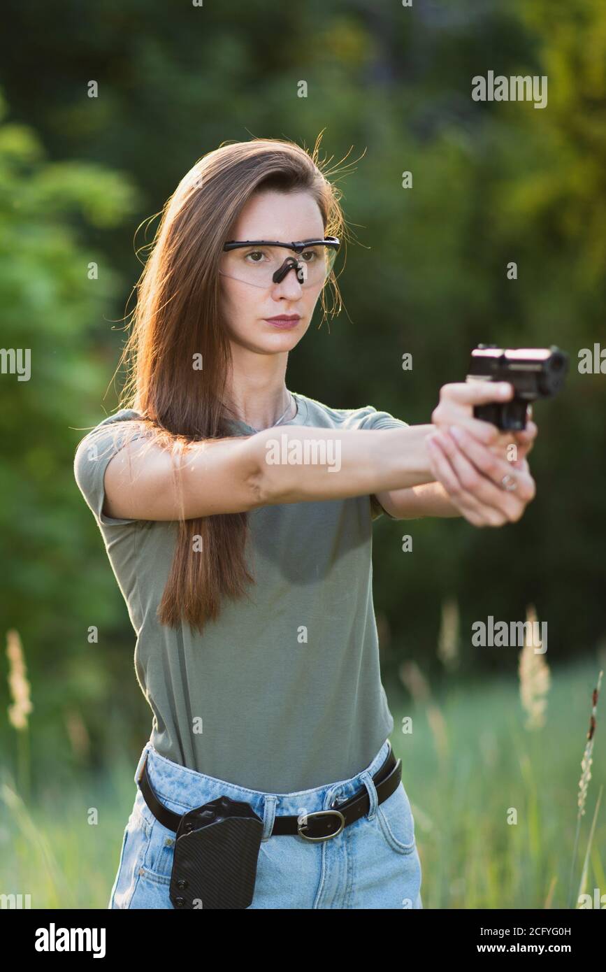 Shooting practice woman gun hires stock photography and images Alamy