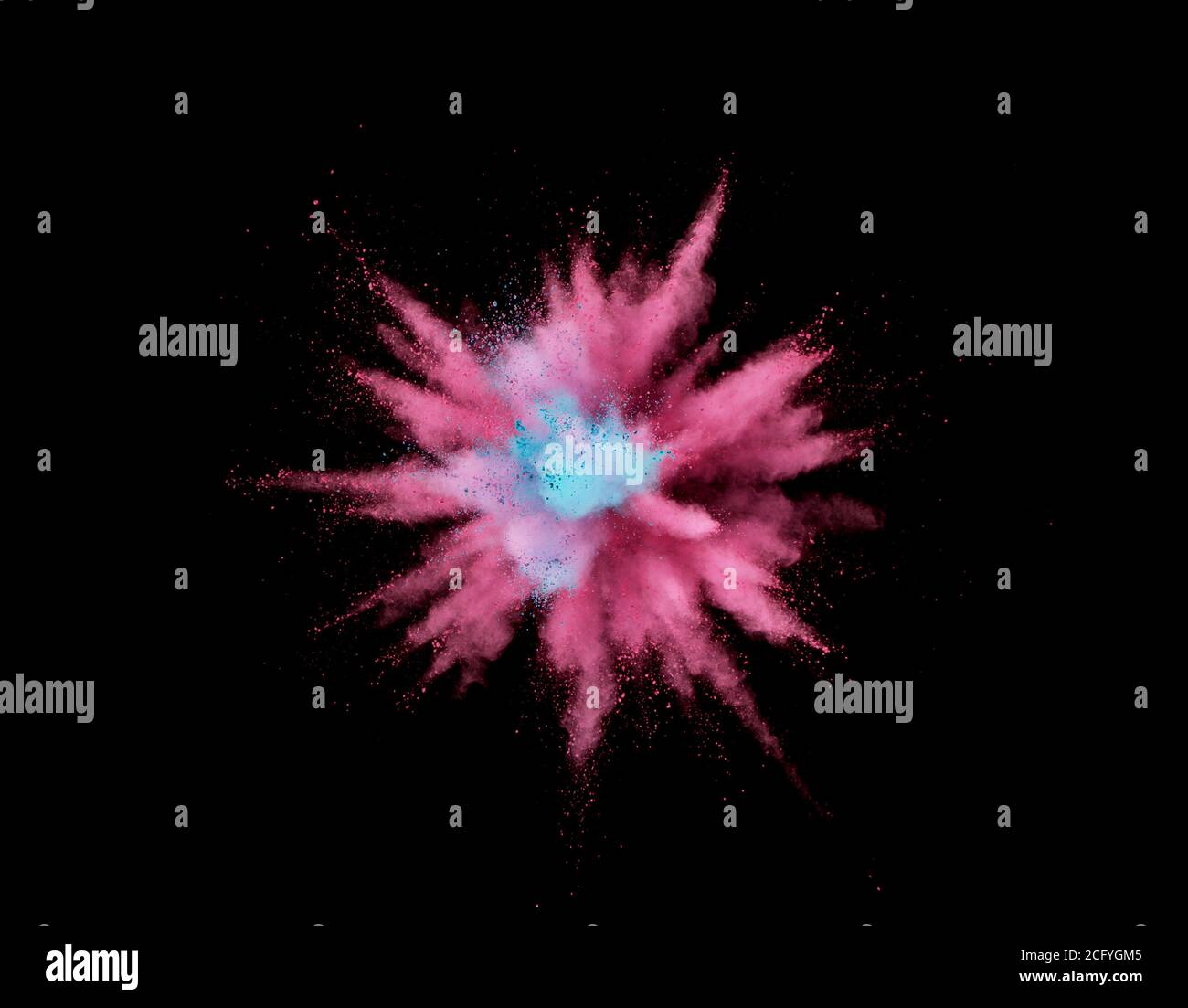 Abstract coloured powder explosion on black background Stock Photo
