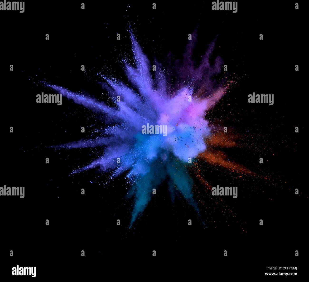 Abstract coloured powder explosion on black background Stock Photo