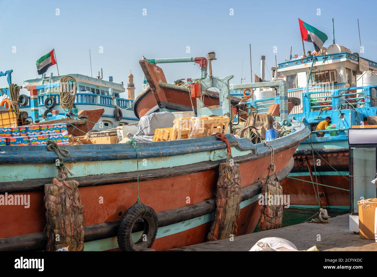 Wooden dhow cargo boats loaded with merchandise on Dubai Creek, United Arab Emirates Stock Photo