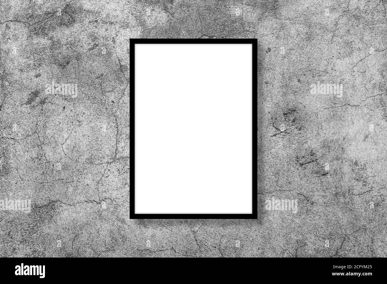 Blank white vertical rectangle poster mock up in black frame on gray