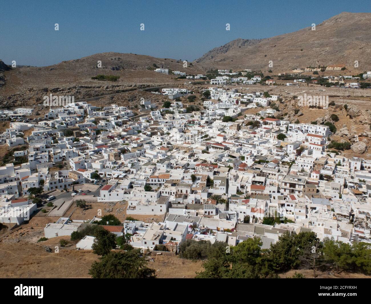 Lindos fishing village below the Acropolis in Rhodes Greece Stock Photo