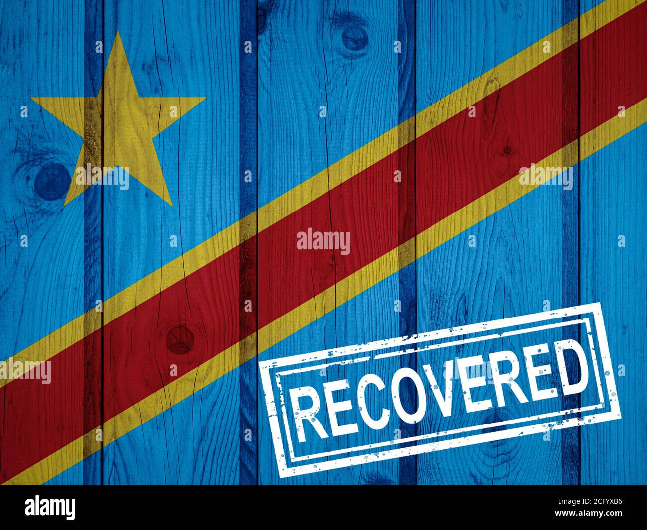 flag of Democratic Republic of the Congo that survived or recovered from the infections of corona virus epidemic or coronavirus. Grunge flag with stam Stock Photo