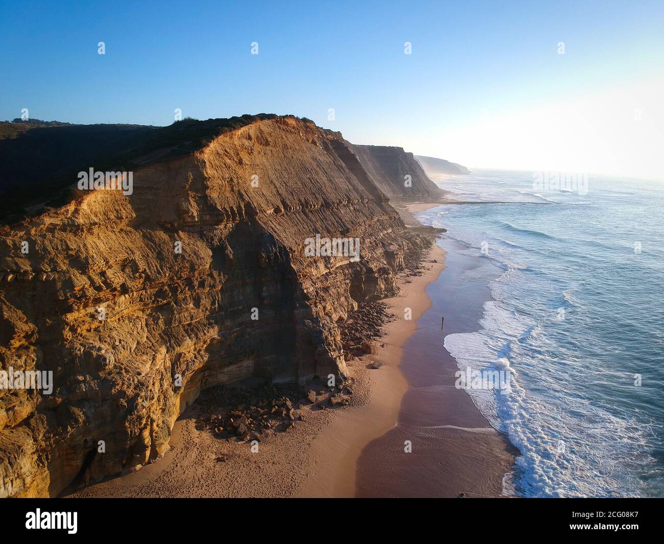 Aerial view from an amazing sandy beach with a cliff Stock Photo