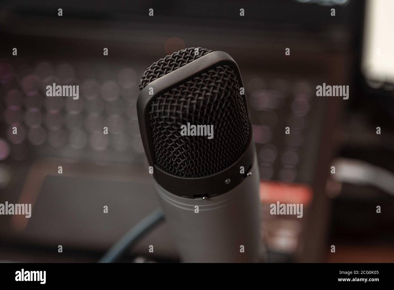 Microphone and computer at studio Stock Photo - Alamy