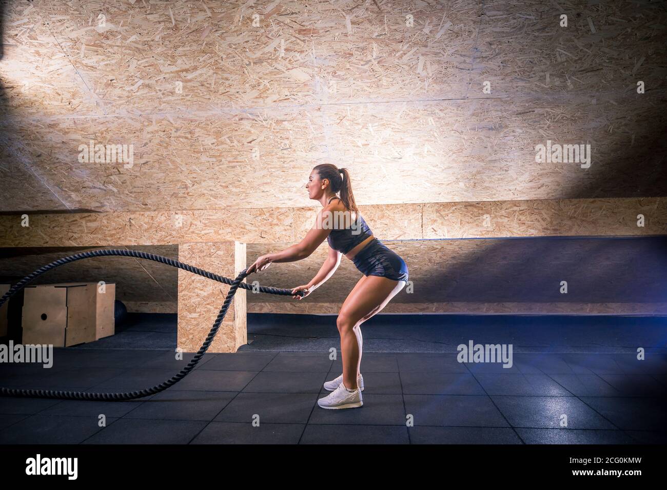 Fitness battling ropes at gym workout fitness exercise Stock Photo - Alamy