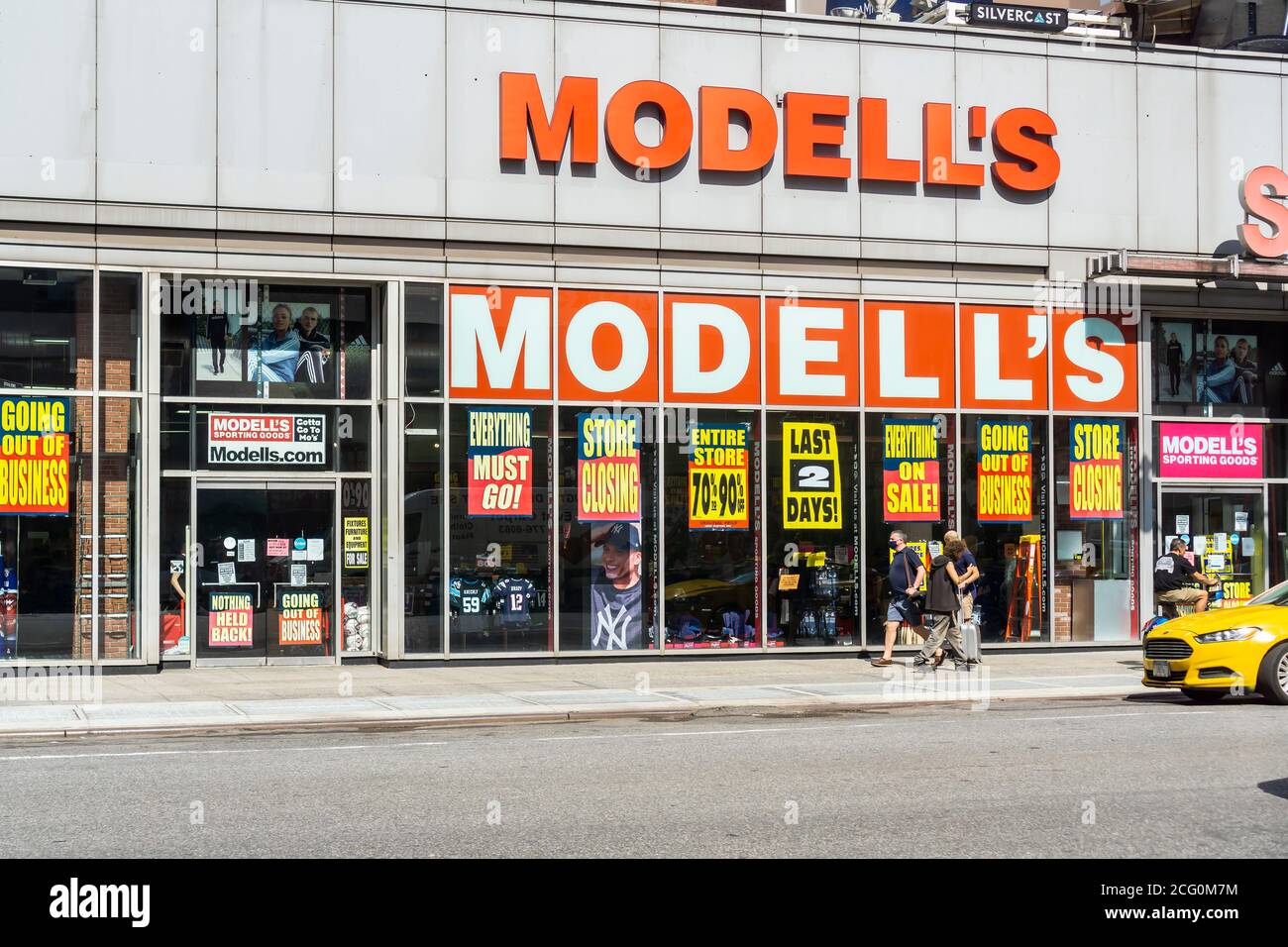 A Midtown Manhattan location of the family-owned sporting goods chain, Modell's, is plastered with signs announcing that the store is closing, seen in New York on Friday, August 28, 2020. The 131 year old chain has filed for bankruptcy protection and is closing all of its 115 stores.(© Richard B. Levine) Stock Photo