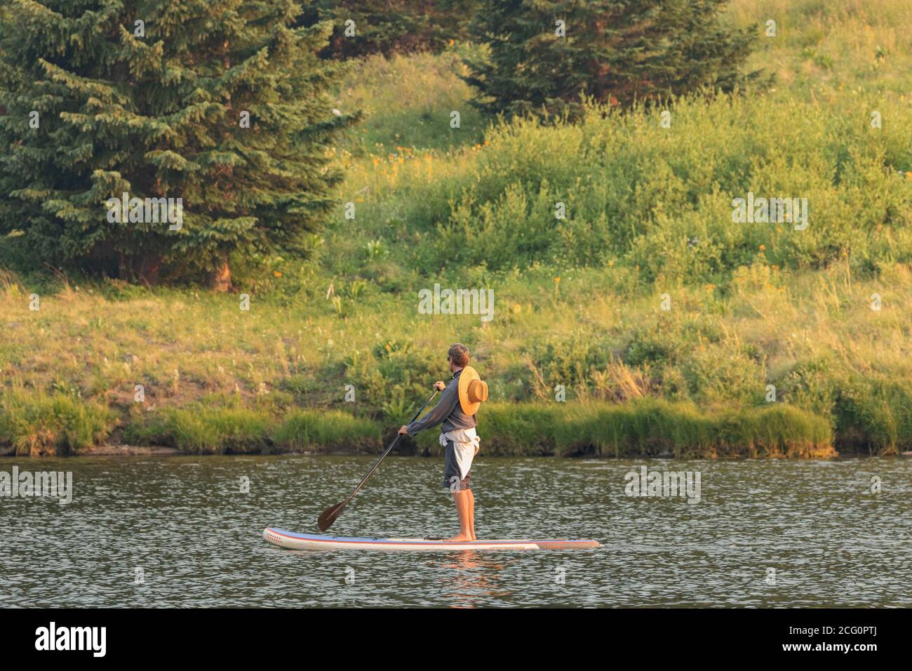 Evening on the Paddle Board Stock Photo