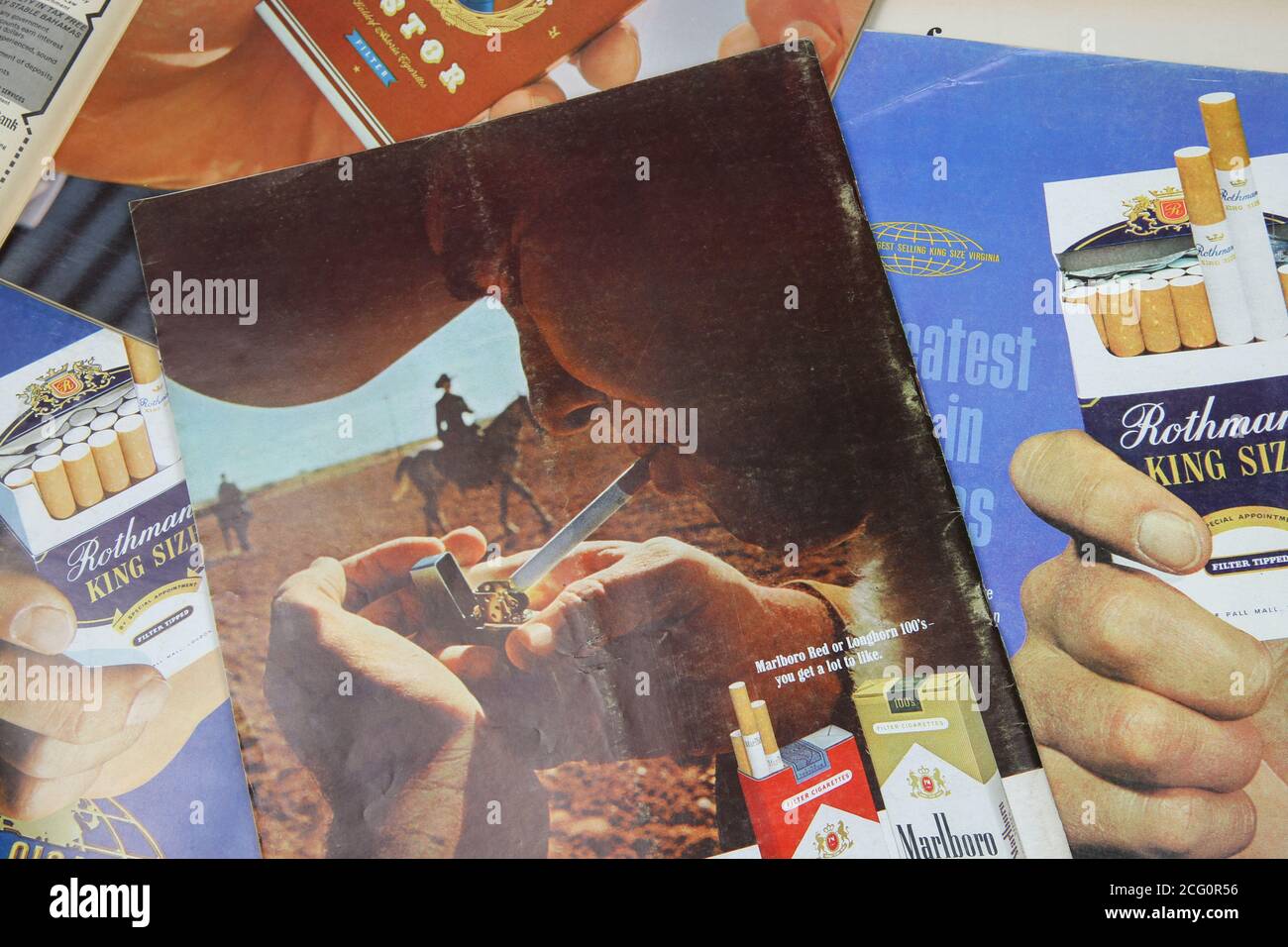 Viersen, Germany - July 9. 2020: View on vintage paper magazines with tobacco advertising from the sixties Stock Photo