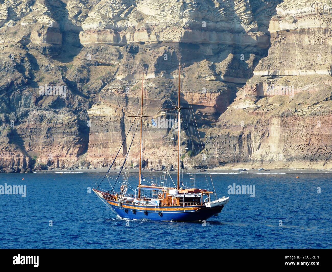 Romantic yacht in the Mediterranean sea near Crete island, Greece. Sail vessel. Wooden ship. Boat trip. Stock Photo