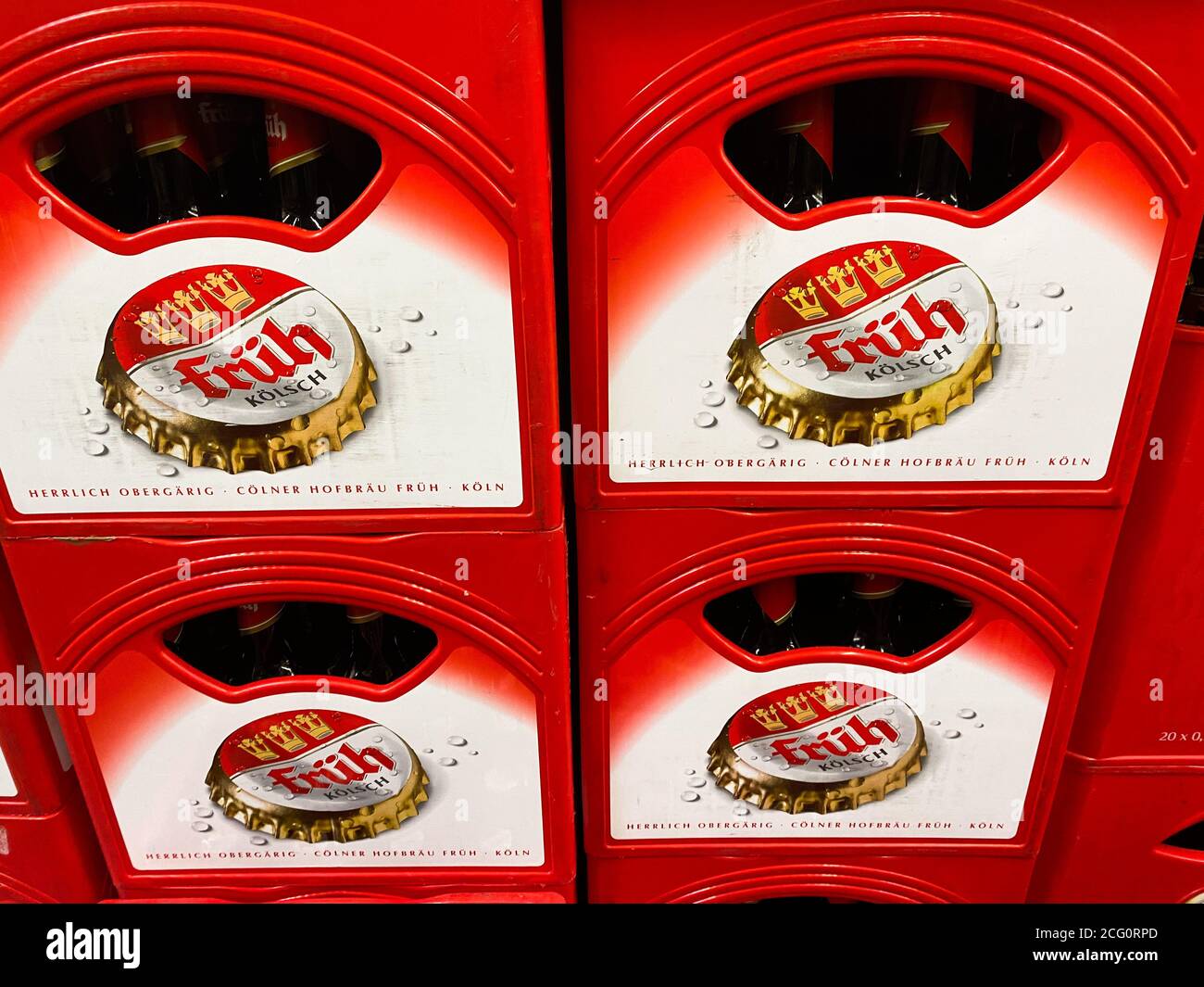 Viersen, Germany - July 9. 2020: View on stack of red cases with Früh Kölsch beer from cologne in german supermarket (fokus left) Stock Photo