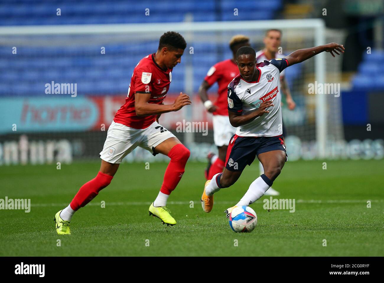 BOLTON, ENGLAND. SEPTEMBER 8TH 2020 Boltons Daniel Powell chases down Crewe's Travis Johnson during the EFL Trophy match between Bolton Wanderers and Crewe Alexandra at the Reebok Stadium, Bolton. (Credit: Chris Donnelly | MI News) Credit: MI News & Sport /Alamy Live News Stock Photo